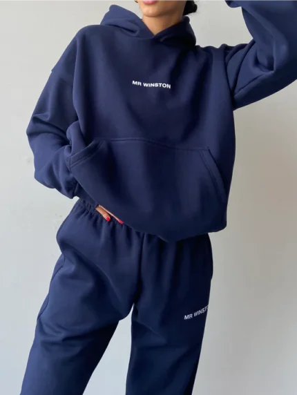 Mr. Winston Navy Puff Tracksuit - Elevate your casual look with this navy puff tracksuit from Mr. Winston, offering a stylish and comfortable ensemble for your everyday streetwear.