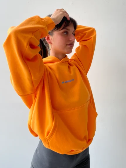 Mr. Winston Orange Puff Hoodie - Add a burst of warmth and style to your wardrobe with this vibrant orange hoodie from Mr. Winston, featuring a chic puff design for a cozy and fashionable look.
